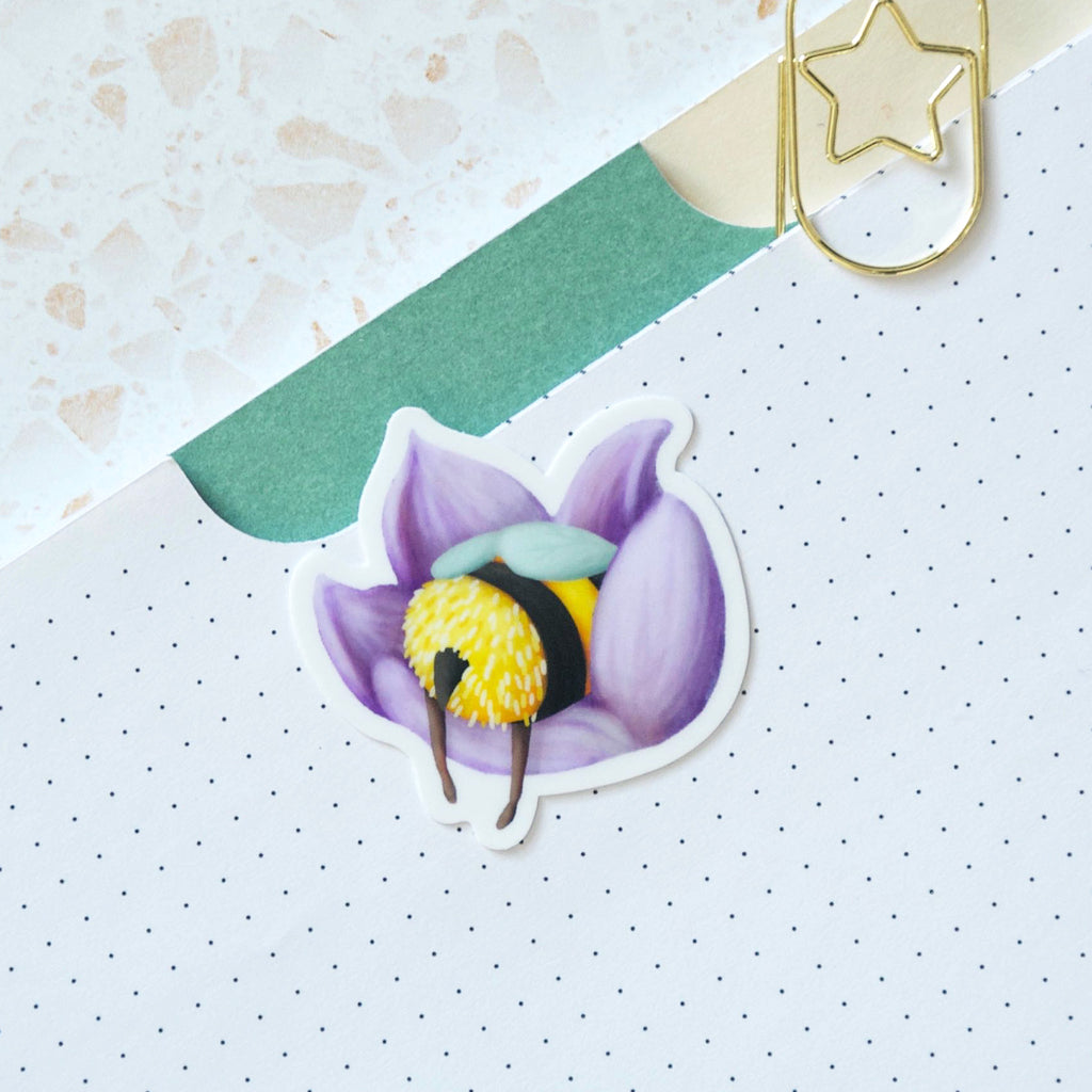 Sleeping bumble bee in a purple flower vinyl sticker