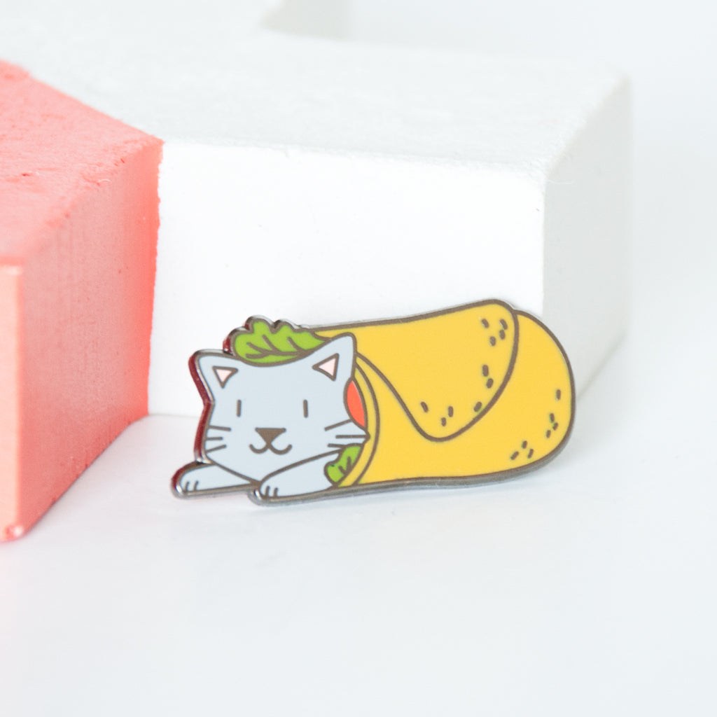 Grey cat wrapped up in a burrito, tortilla wrap enamel pin