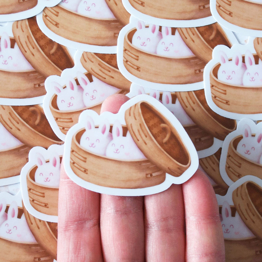 Bunny shaped dumplings in a bamboo dim sum container vinyl sticker