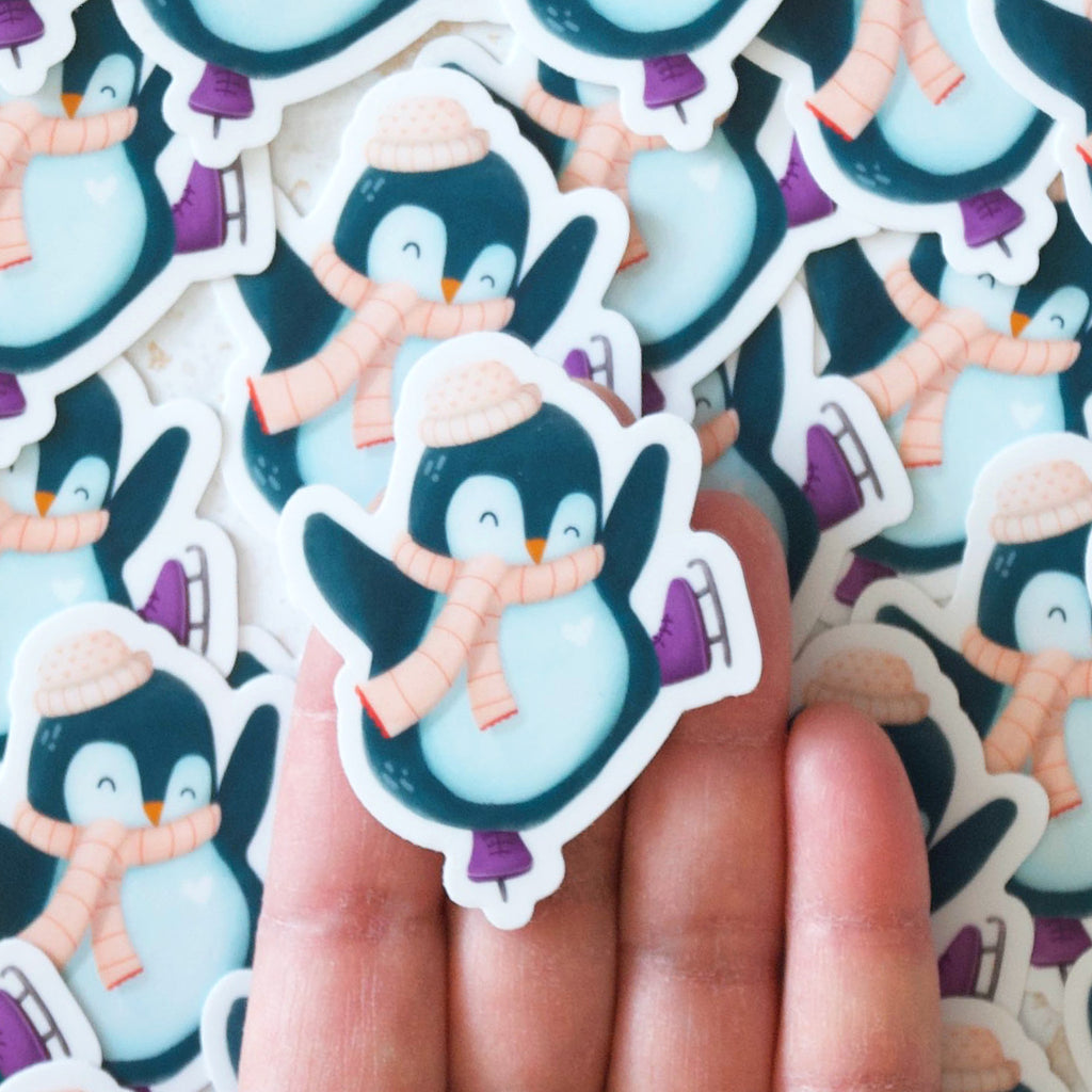 Pile of cute blue penguins skating vinyl sticker