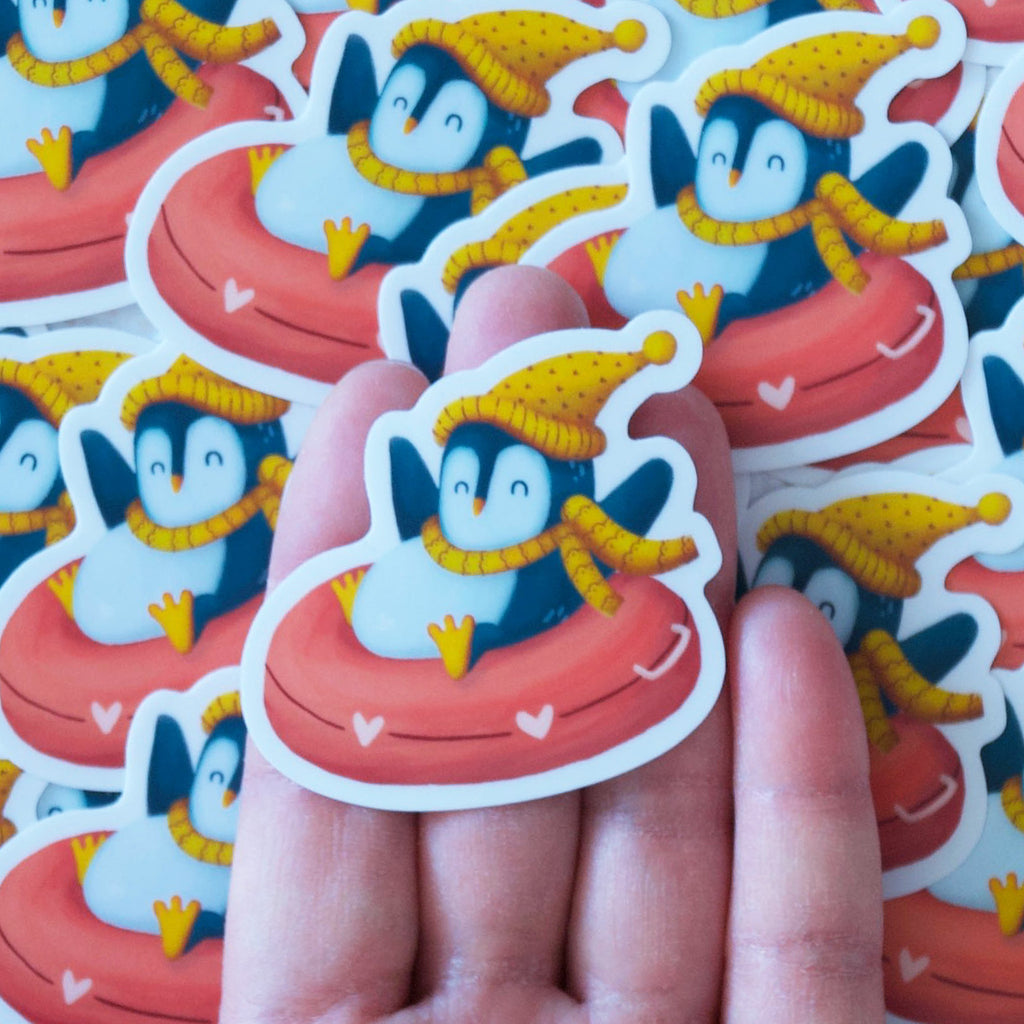 Pile of penguins in cute toboggans, vinyl sticker