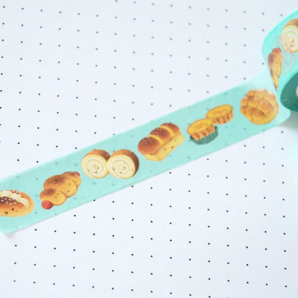 Asian baked pastries on a teal background washi tape