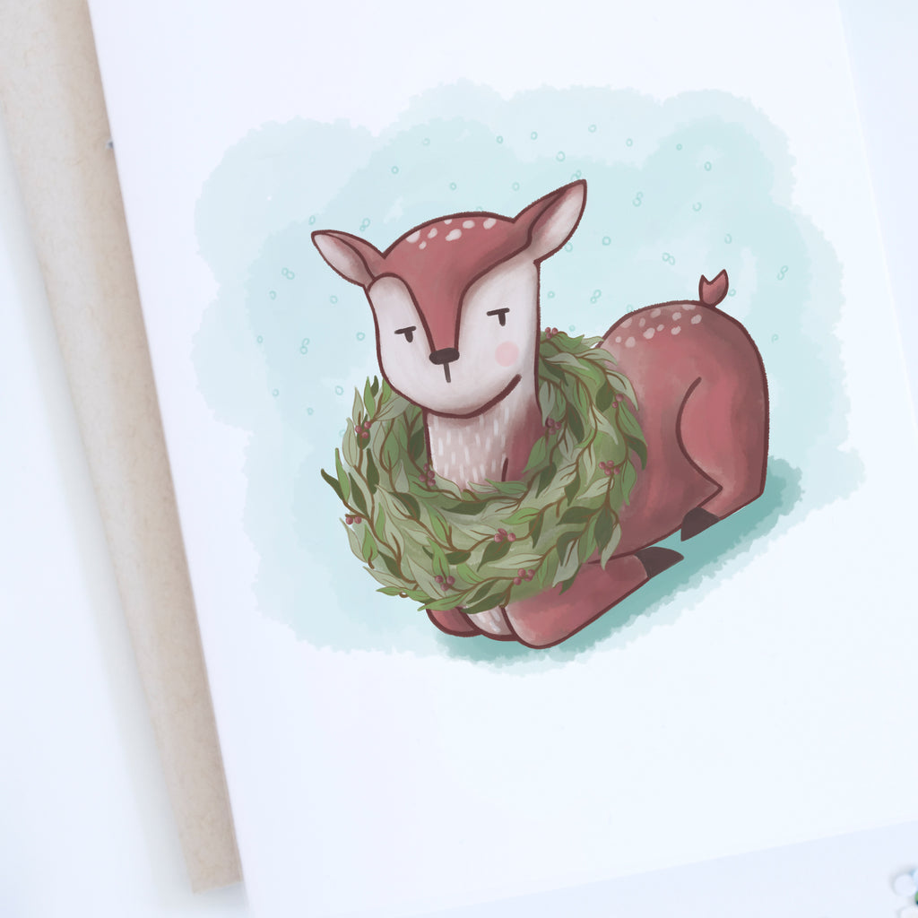Close up of deer with wreath illustrated holiday card