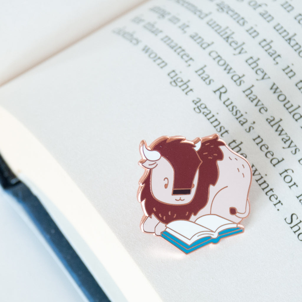 Bison reading a book hard enamel pin