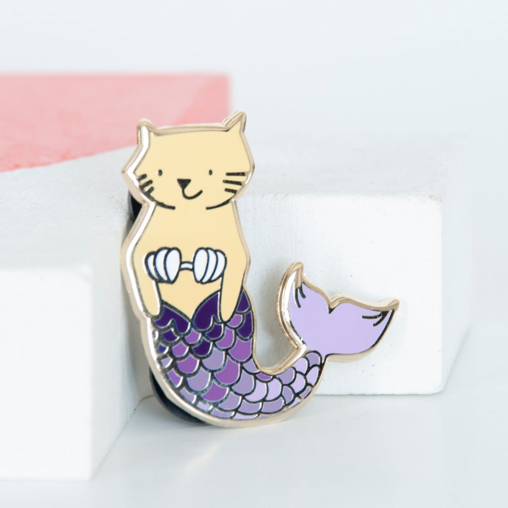 Yellow cat mermaid with purple scales enamel pin