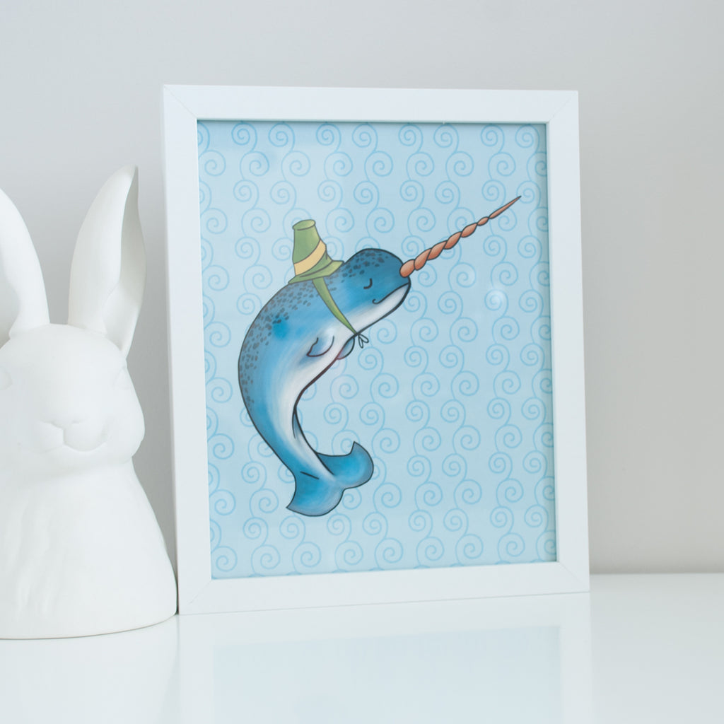 Blue narwhal wearing a green hat on a blue background. 8x10 illustrated digital print
